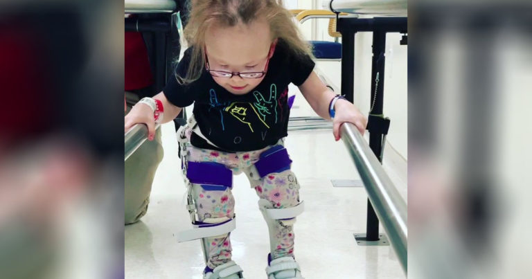 girl-with-dwarfism-walks