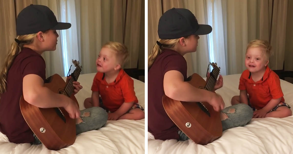 down-syndrome-boy-listens-sister-music