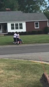 Middle-School-Football-Players-Helps-Wheelchair-bound-Elderly-Woman