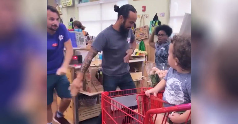 Trader-Joe's-employees-dancing-toddler-tandrum