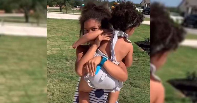 baby-girl-waits-big-sister-after-school