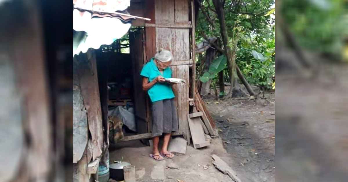 poor-woman-reads-bible