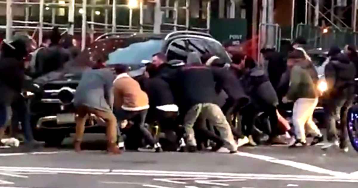 strangers-save-woman-under-suv
