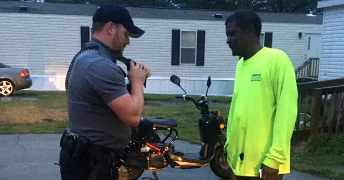 officer-helps-knot-tie