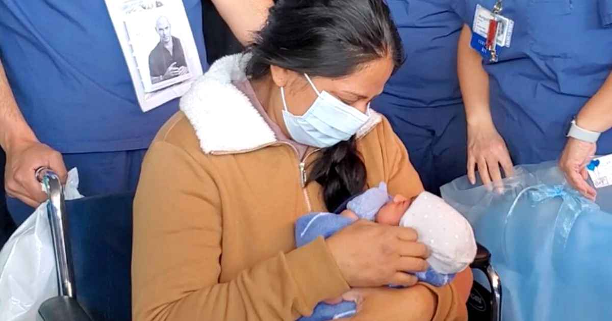 coronavirus-survivor-meets-baby-for-first-time