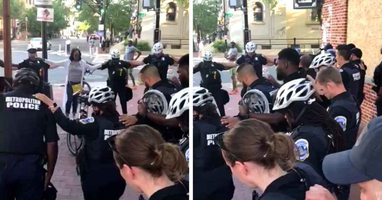 woman-prays-with-police-officers
