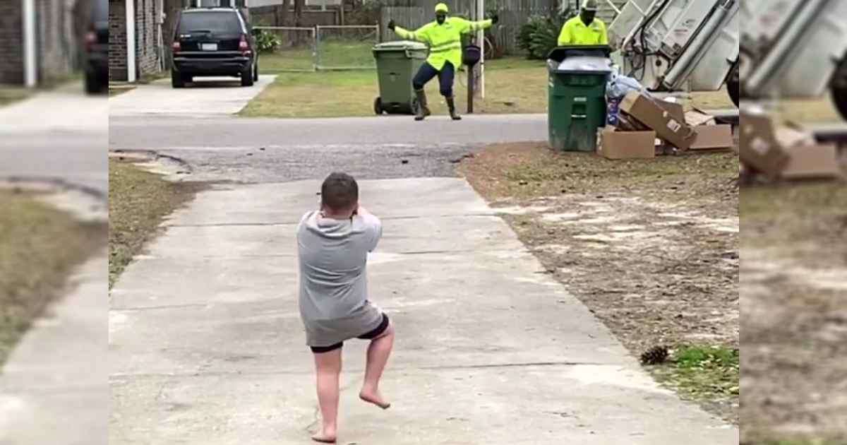 sanitation-worker-dances-with-little-boy