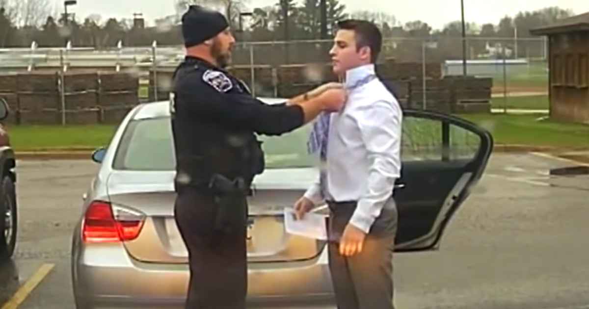 police-officer-ties-tie-for-student