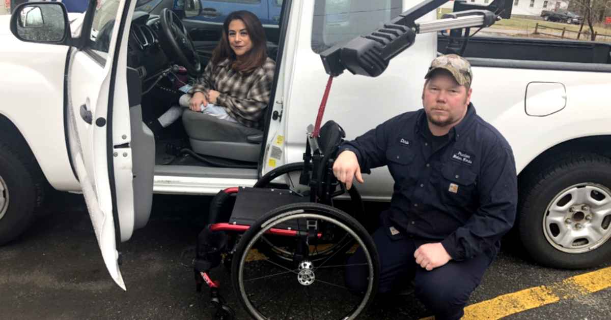 mechanic-fixes-woman's-wheelchair-christian-barber