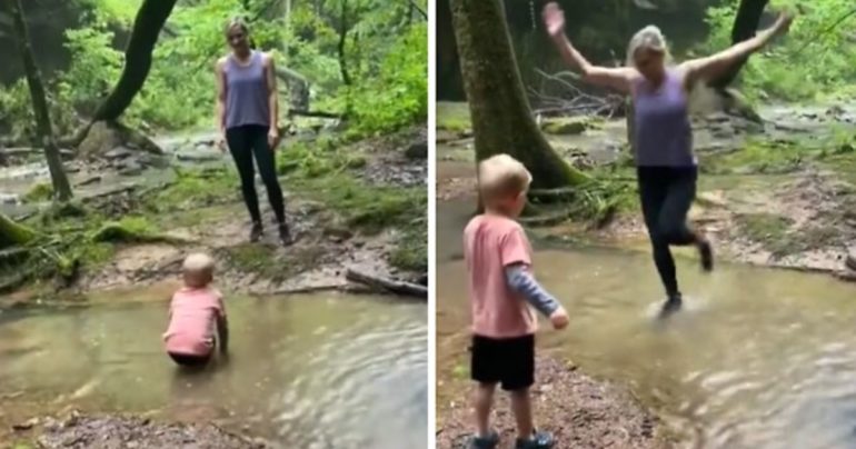 boy-helps-woman-cross-water
