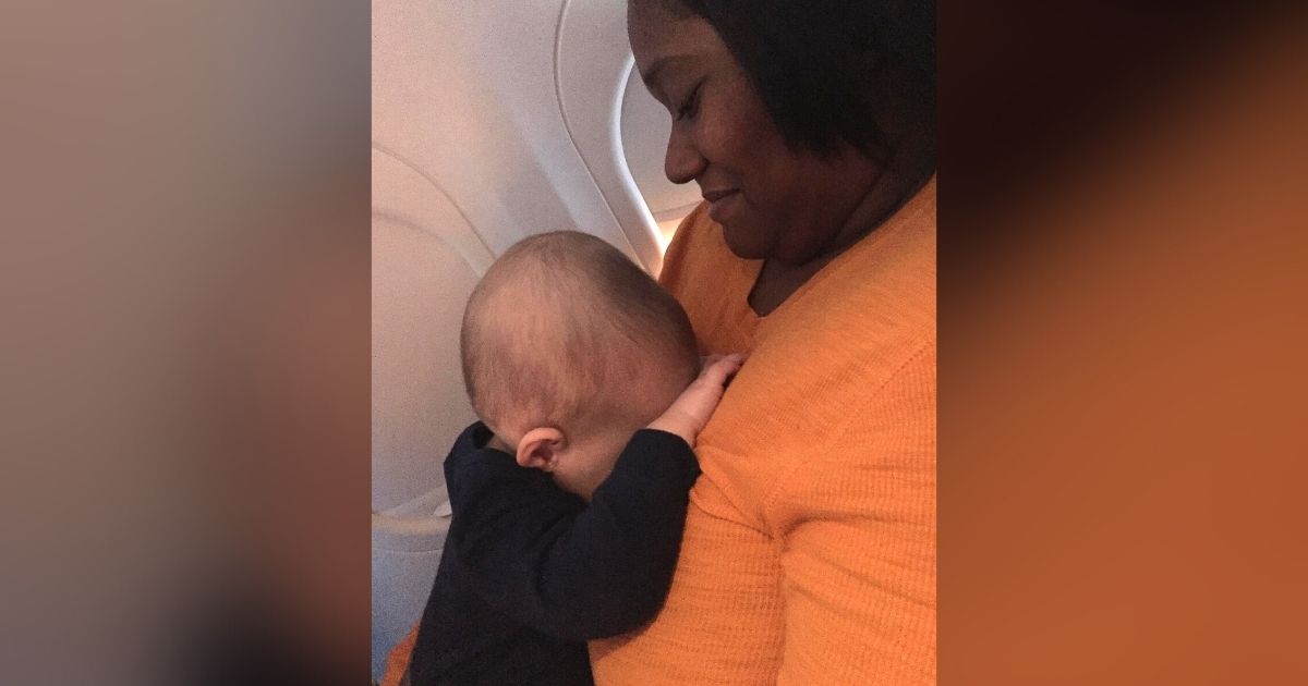 stranger holding baby