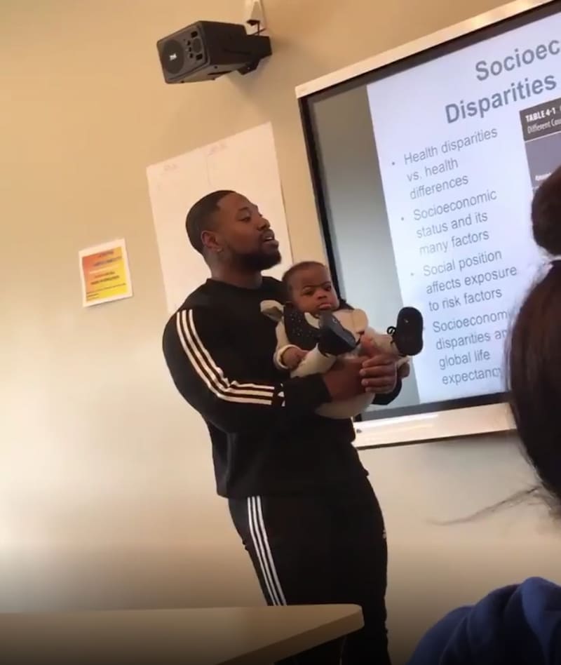 professor-holds-baby