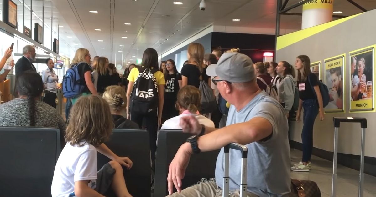 choir singing at airport