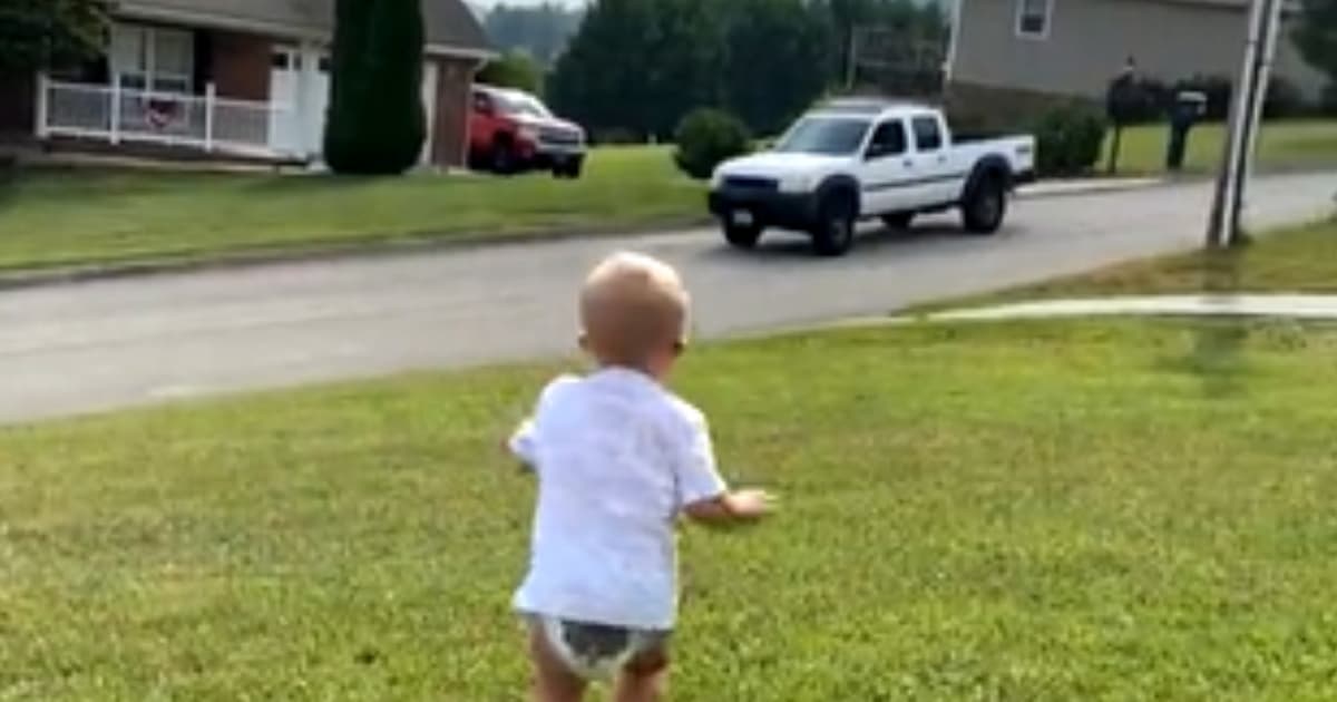 baby boy sees dad