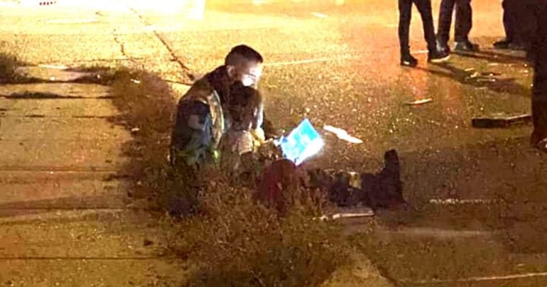 firefighter reads to little girl