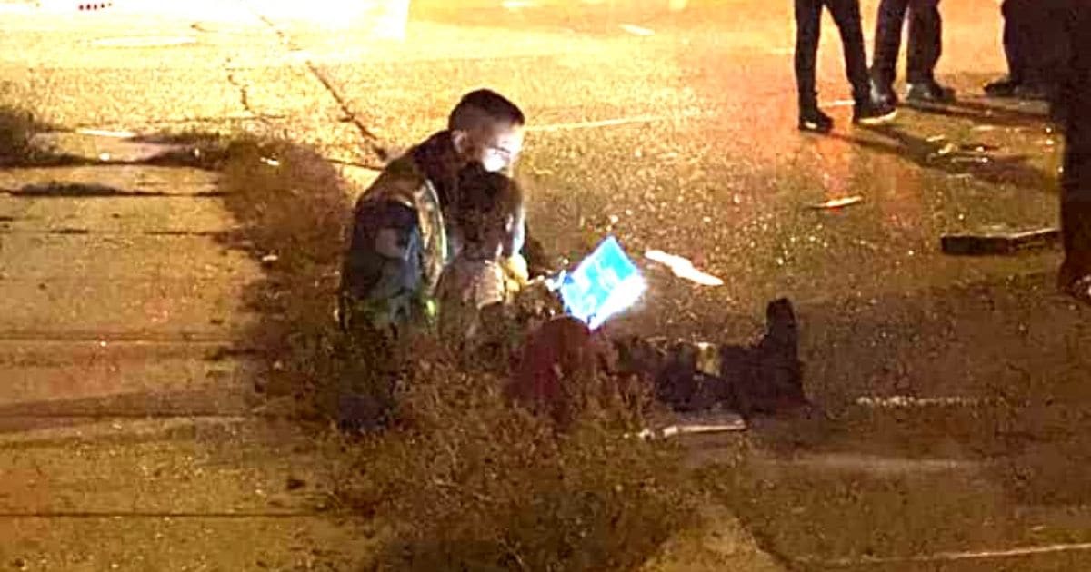 firefighter reads to little girl