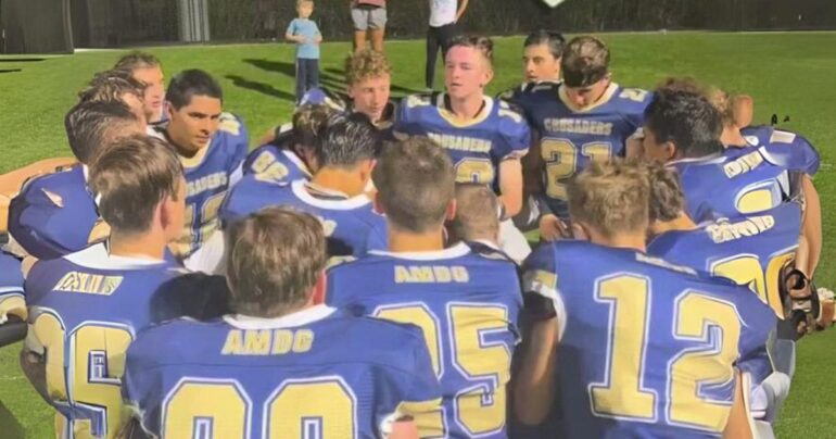 football team sings ave maria