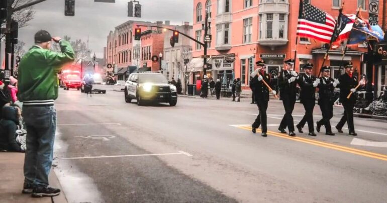 veteran saluting american flag