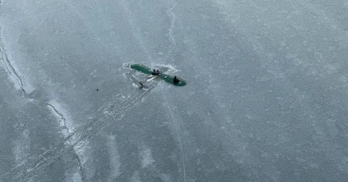 plane lands on frozen lake