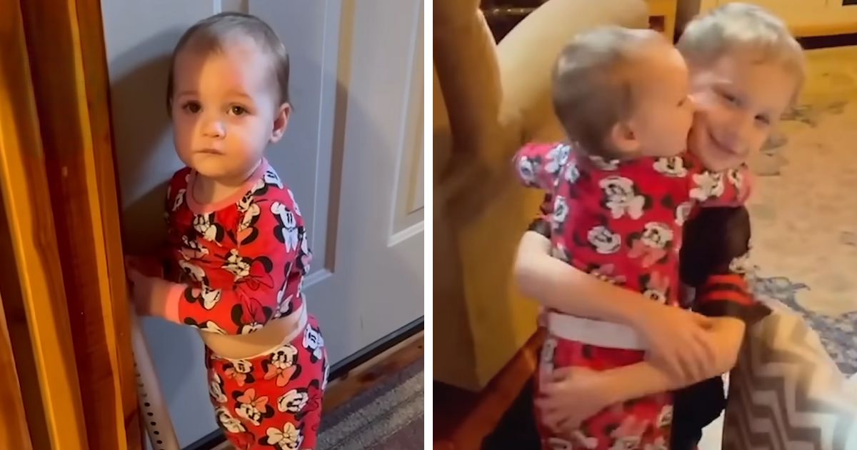 little girl hugging brother