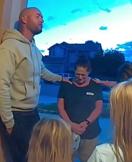family prays for delivery driver