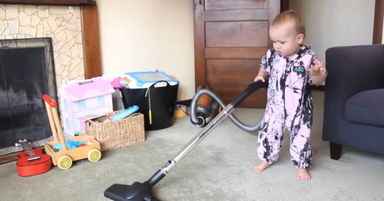 baby doing chores