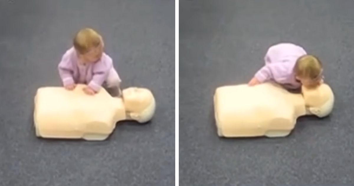 baby doing cpr on dummy video