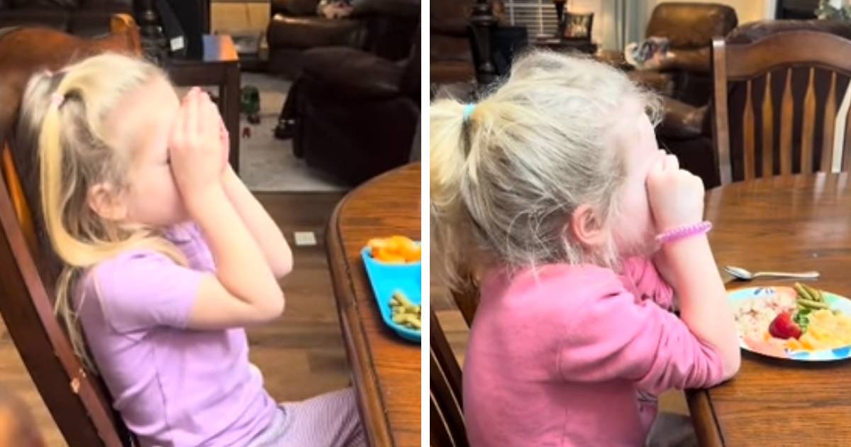 little girl praying before meal